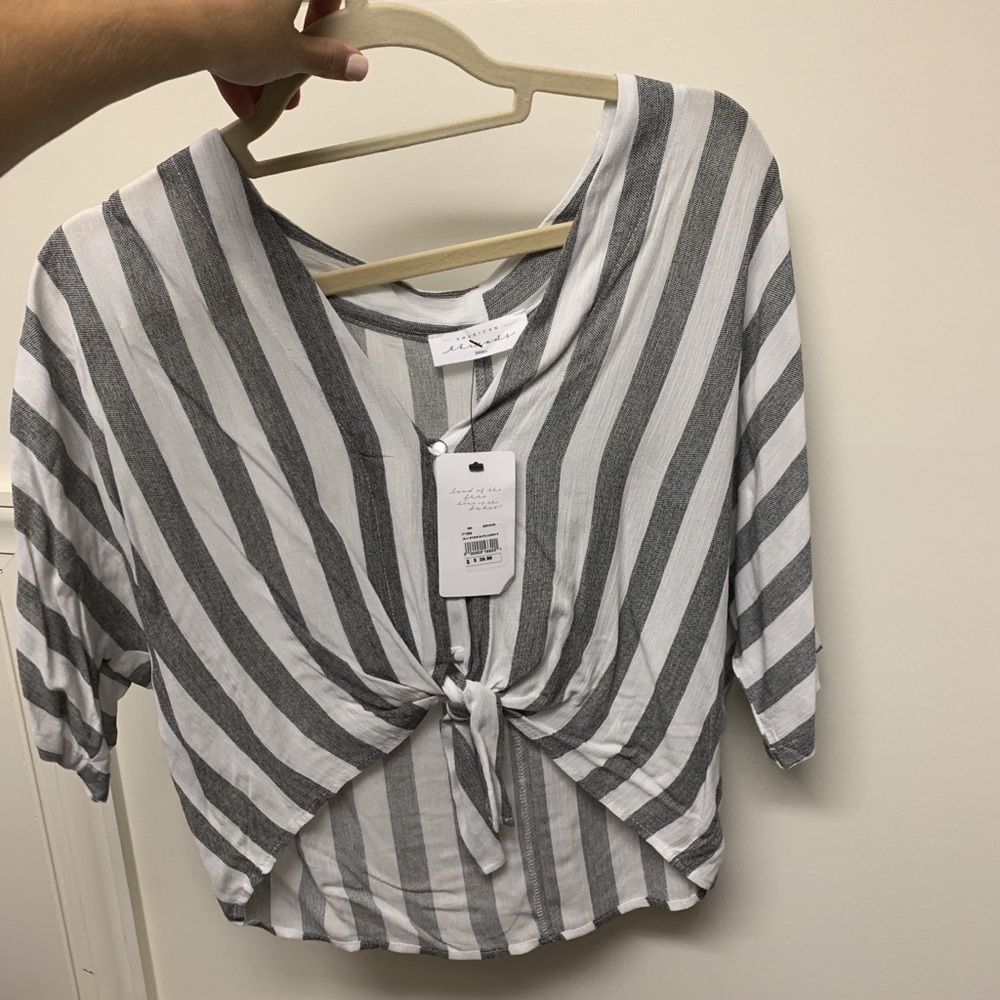 Gray and white striped top. Super cute on.